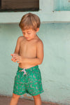 Boy Modeling Green Paisley Boy Swim Shorts